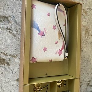 Coach chalk multi colored wristlet